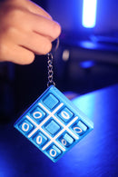 JOGO DA VELHA PORTÁTIL CHAVEIRO – DIVERSÃO INSTANTÂNEA EM QUALQUER LUGAR!